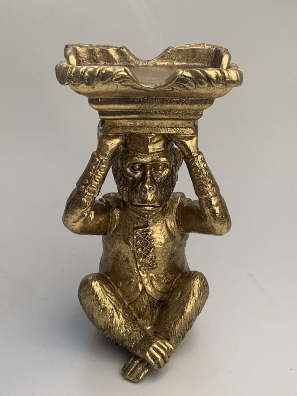 Gouden aap met plaats voor een kaars